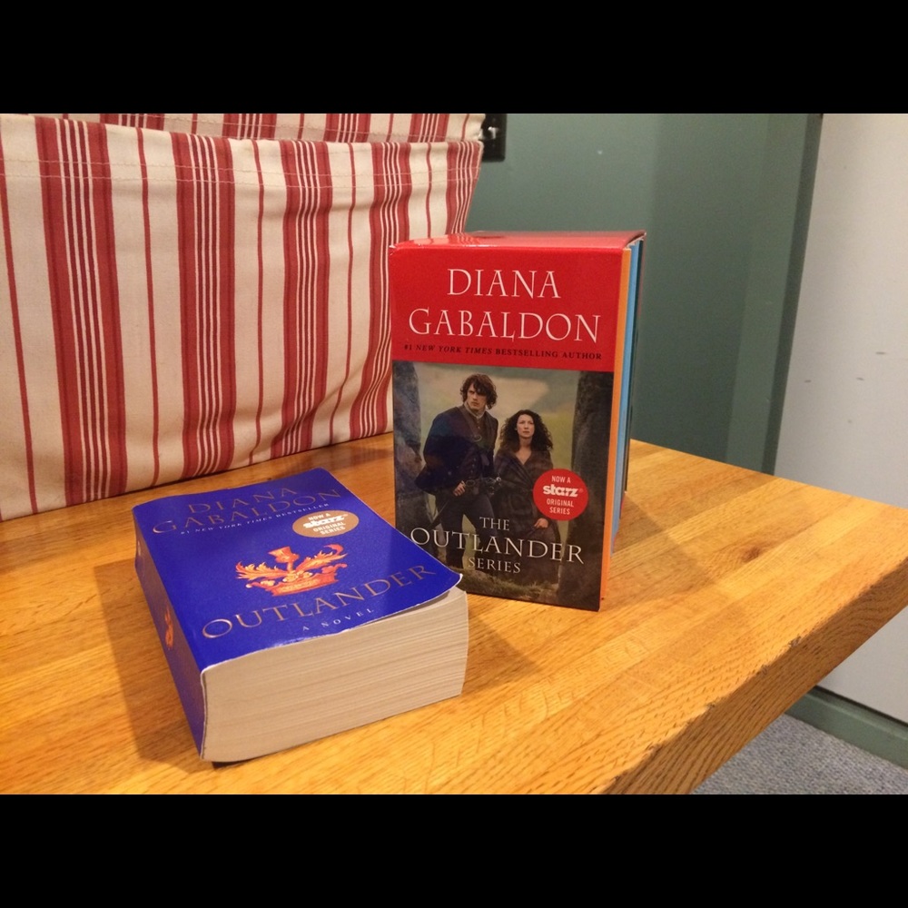 Outlander books.  First 4 in the series.